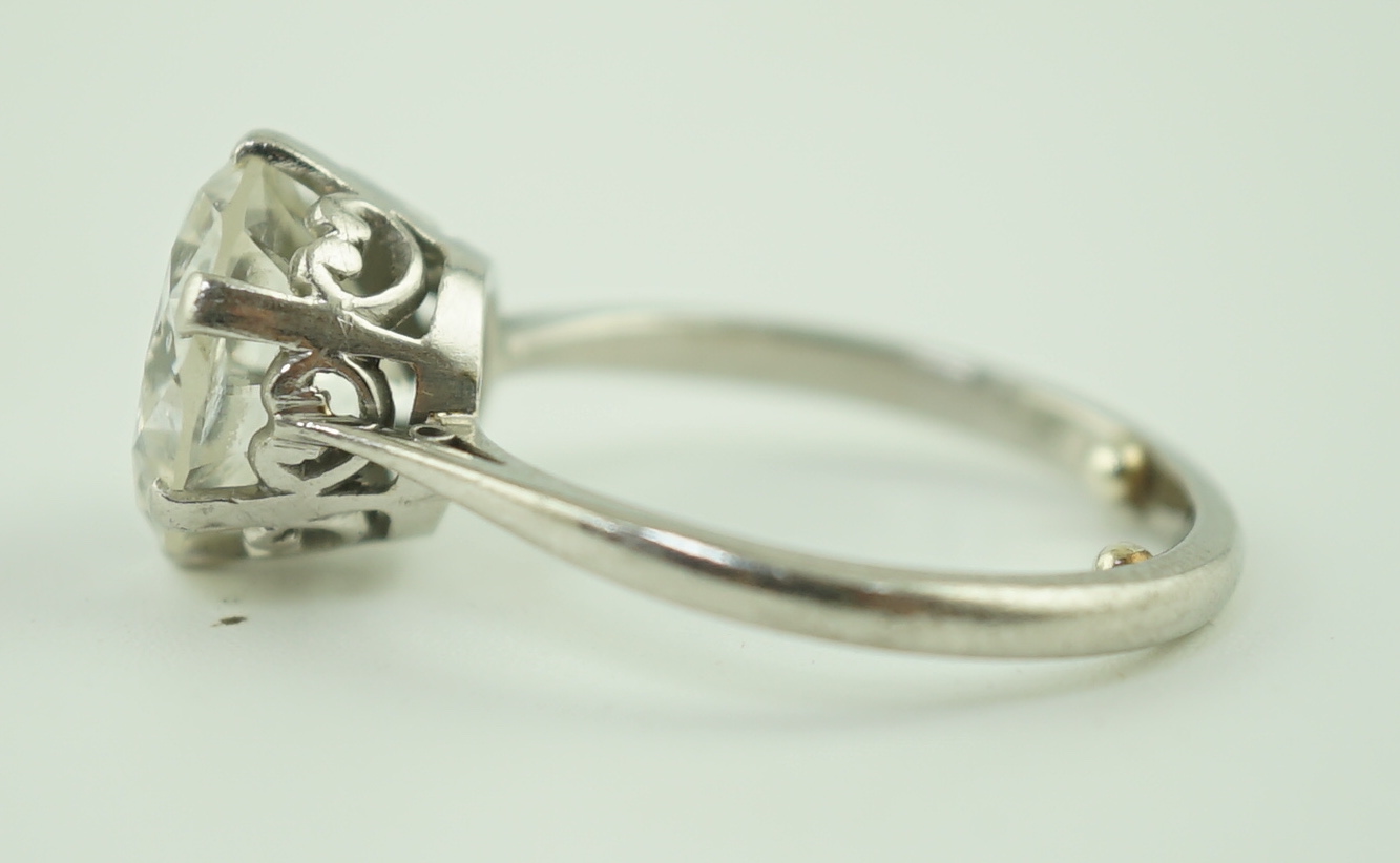 A mid 20th century platinum and solitaire diamond set ring